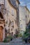 Typical narrow French terraced street in Provence, France