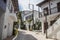 Typical narrow Greek streets and architecture with country side houses style