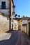 Typical narrow streets of the medieval town of ChinchÃ³n in Madrid, houses and old architecture in a quiet and relaxing