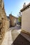 Typical narrow streets of the medieval town of ChinchÃ³n in Madrid, houses and old architecture in a quiet and relaxing