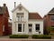 Typical neat suburban dutch house with front garden