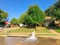 Typical neighborhood area with stop sign near Dallas, Texas, America with open yellow fire hydrant