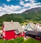 Typical Norwagian architecture in Odda town, Hordaland county, Norway. Beautiful summer view of countryside. Traveling concept