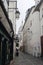 A typical old cobbled narrow street in Montmartre district in Paris