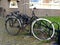 Typical old Dutch bike in bicycle rack or bicycle stand