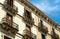 Typical old french facade with balconies nice pattern