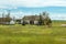 Typical old salas in Vojvodina, a traditional type of property in the Pannonian Plain region, with family house and agricultural