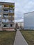 Typical panel house with balconies. Old urban residential house in Europe. The windows of an ordinary soviet building