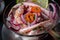 Typical Peruvian food, ceviche with squid, shrimp and white fish with purple onion and a good tiger`s milk. Served in a glass