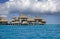 Typical Polynesian landscape -small houses on water.