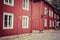 Typical red houses in open air museum Wadkoping, Sweden