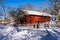 Typical red Scandinavian wooden house, barn or farm.