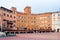 Typical renaissance facades of buildings in Piazza del Campo in Siena in Tuscany, Italy