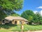 Typical residential house mailbox and blossom bluebonnet wildflower front yard in Dallas, Texas, USA