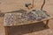 Typical roadside scene where you can stop and buy Stone souvenirs at Dorob National Park in Namibia