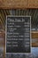 Typical roadside stall in Indonesia with Today\'s Menu written on board