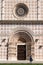 Typical Romanesque rose window of the portal of Basilica Santa Maria di Collemaggio in L\'Aquila, Italy