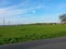 Typical rural image, with villages, fields, hills and blue skies on sunny spring or summer day