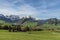 Typical rural landscape in the Appenzell region in Switzerland, view to the snow-capped Alpstein mountains with Saentis