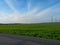 Typical rural landscape image with villages, fields, hills and blue skies on a sunny spring or summer day