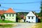 Typical rural landscape and peasant houses in the village Somartin, Martinsberg, MÃƒÂ¤rtelsberg, Transylvania, Romania.