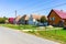 Typical rural landscape and rustic houses in Barcut -Bekokten, Transylvania, Romania, 2021