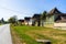 Typical rural landscape and rustic houses in Barcut -Bekokten, Transylvania, Romania, 2021