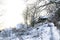 Typical russian abandoned snow-covered village in winter day