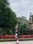 Typical Scottish bagpipe player on the streets of Edinburgh Scotland UK