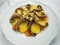 Typical Sicilian cuisine, octopus with potatoes, celery and carrots, with olive oil.