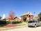 Typical single family home in Texas, America with bright red col