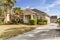 Typical Single Floor American House with Front Yard and Spacious Driveway Exterior Street View