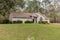 Typical Single Floor American House with Front Yard and Spacious Driveway Exterior Street View