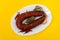 typical smoked sausage chourico on white dish