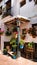 Typical south of Spain house with white walls and beautiful flowers decorating. Trevelez, Andalusia,