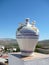 Typical Spanish bojito jar against blue summer landscape