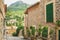 Typical spanish styled streets in Deia town at the west coast of Mallorca, Spain