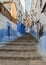 Typical street in Chefchaouen medina, Morocco.