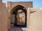 Typical street of the old town of Kashan, iran, with its typical clay walls, ancient gates and clay buildings. Kashan is the main