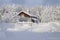 Typical swedish hut in winter