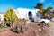 Typical tiny Canarian house with cactus garden on Papagayo beach on the island of Lanzarote, Canary Islands, Spain