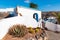 Typical tiny Canarian house with cactus garden on Papagayo beach on the island of Lanzarote, Canary Islands, Spain
