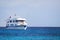 Typical tourist yacht anchored at Gardner Bay, Espanola Island,