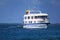 Typical tourist yacht anchored at Suarez Point at Espanola Island, Galapagos National park, Ecuador