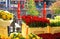 Typical traditional dutch flower market bouquets, yellow sunflowers and red tulips, water canal gracht - Utrecht, Netherlands