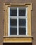The typical views of a house windows in the center of Salzburg
