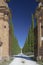 Typical villa in the Italian countryside. Road with cypresses