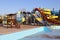 A typical water slide, inline tube slides and the empty pool in Aqua park, Arad.