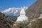 Typical white buddhist stupa near footpath to Everest base camp in Nepal