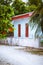 Typical white simple rural house architecture of Maldives village